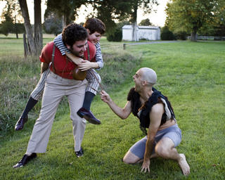 Stephano (Noah Grabeel) and Trinculo (Charlotte Bush) encounter Caliban (Julian Oquendo)